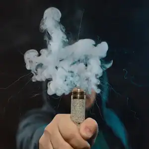 E-cigarette malfunction emitting smoke, showing risk of vape explosions