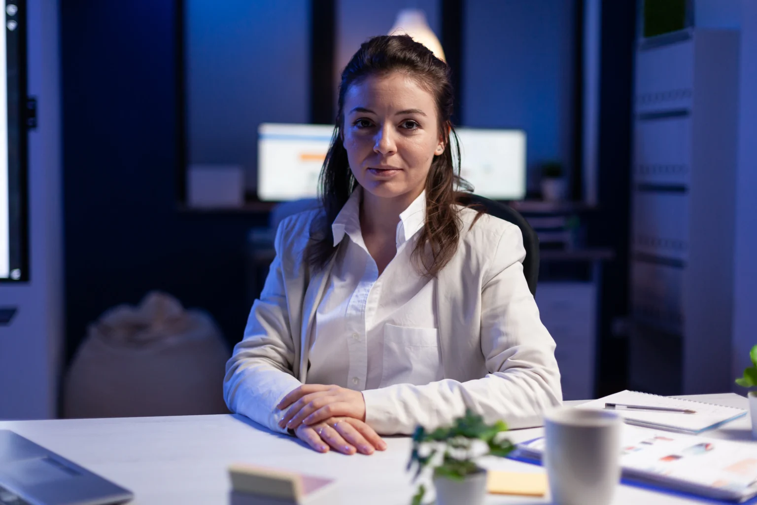 FMLA Retaliation Know Your Rights After Taking Leave: exhausted-businesswoman-looking-tired-camera-sighing-resting-head-palm