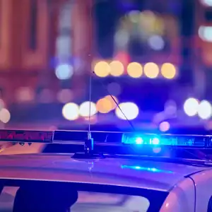 Police vehicle with flashing lights during a pursuit or emergency incident